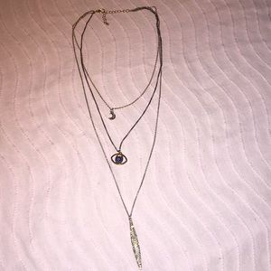 Multi layered, gold, silver and black necklace